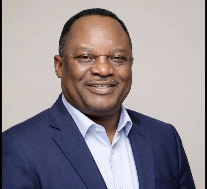 Prophète Dominique Mpolo Khonde in a blue blazer